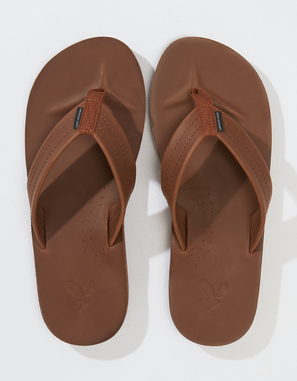american eagle brown flip flops